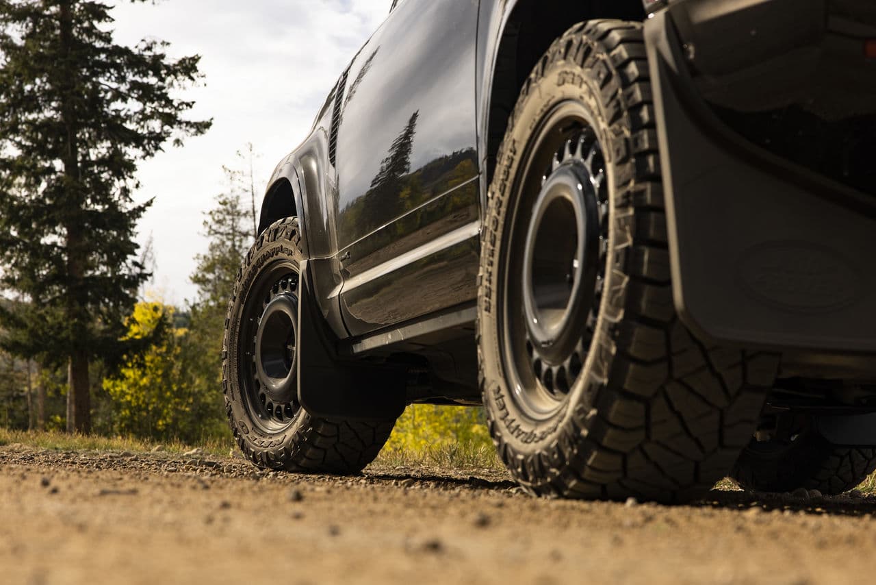 Rear view of 2021 Land Rover Defender with wheels