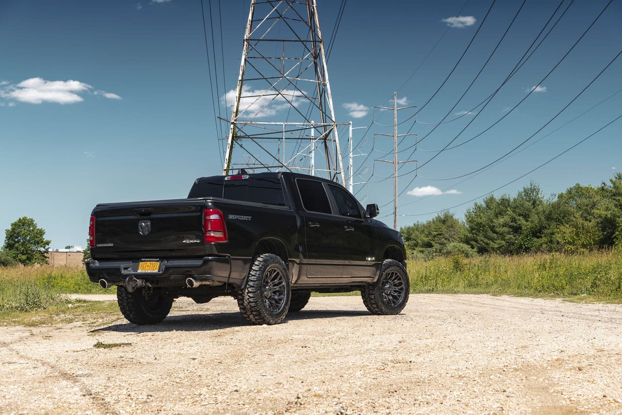 Side profile of 2021 Ram 1500 Big Horn with wheels