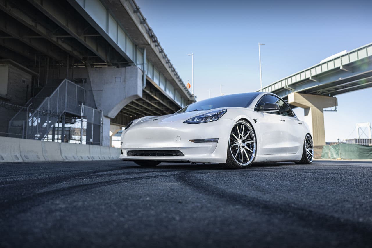 Front view of 2021 Tesla Model 3 with wheels