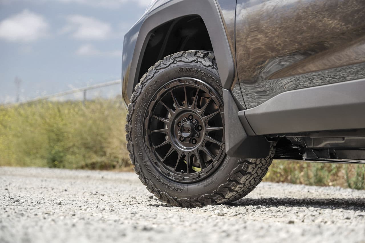 Side profile of 2021 Toyota RAV4 with wheels