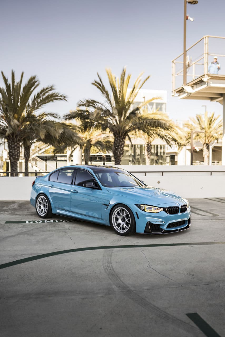 Side profile of 2022 BMW M3 with wheels
