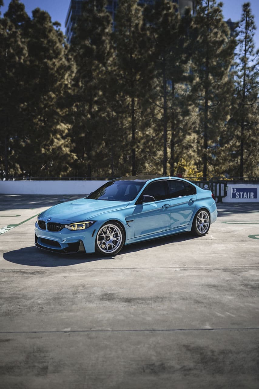 Detail view of 2022 BMW M3 with wheels