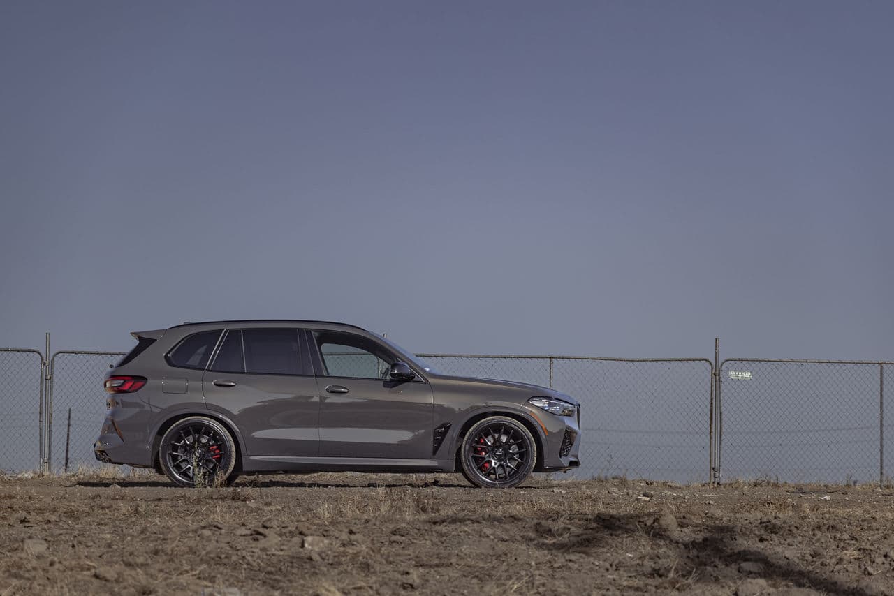 Side profile of 2022 BMW X5M with wheels