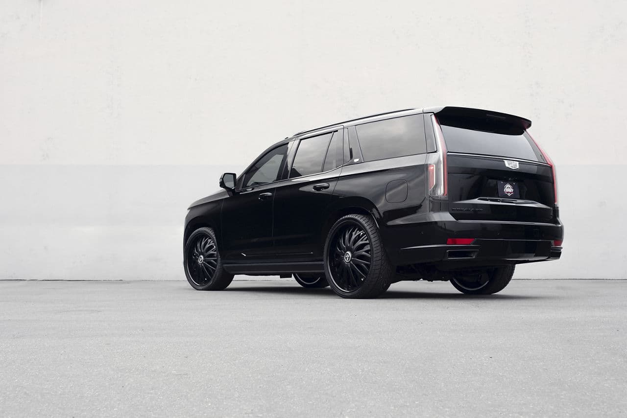 Side profile of 2022 Cadillac Escalade with wheels
