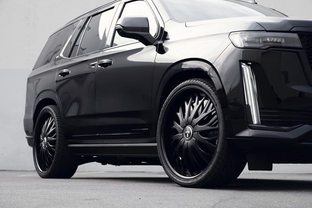 Rear view of 2022 Cadillac Escalade with wheels