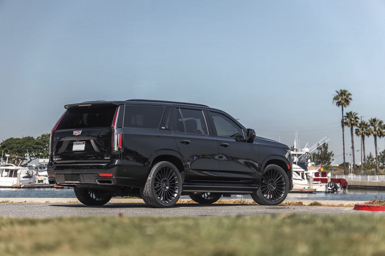 Side profile of 2022 Cadillac Escalade with wheels