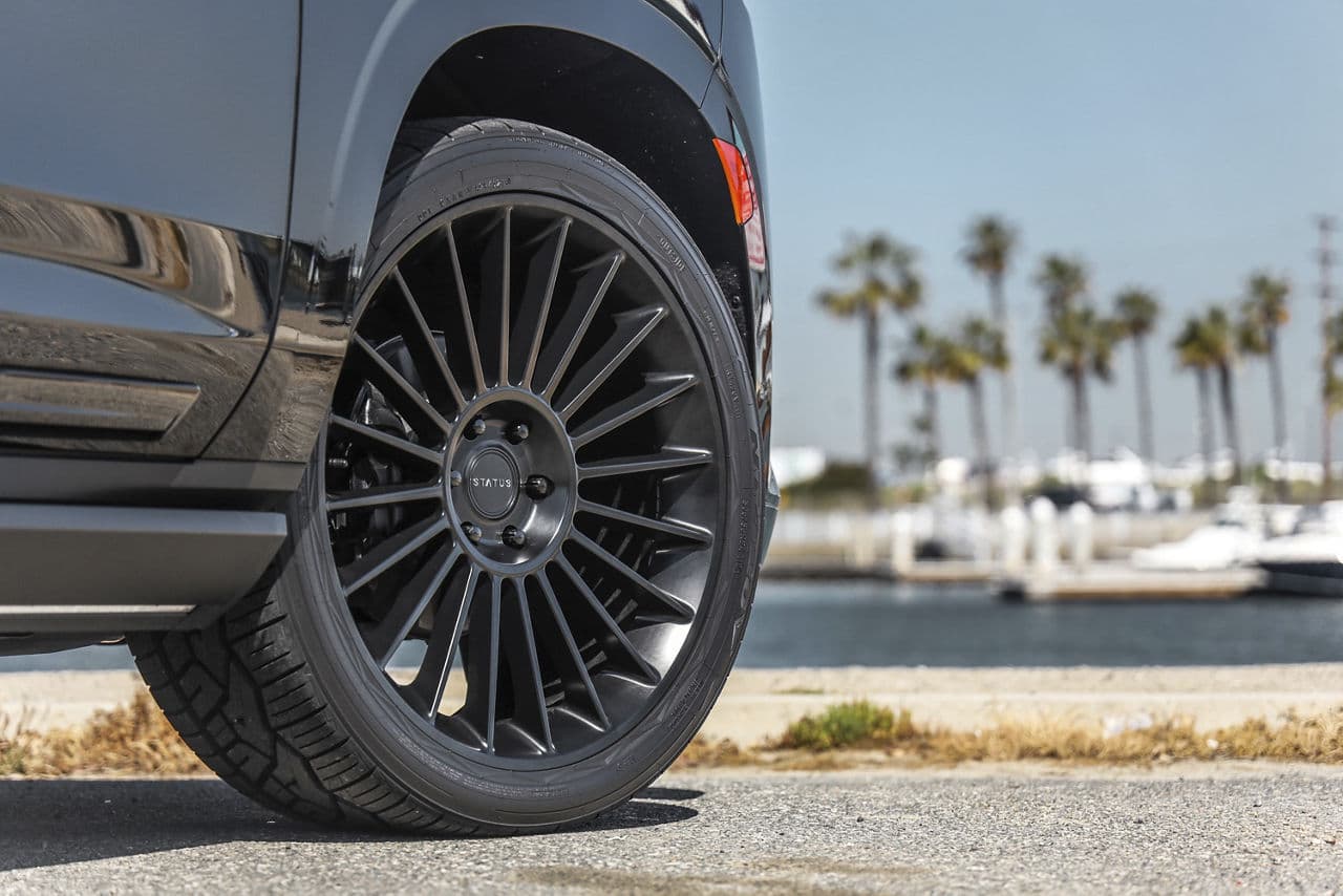 Rear view of 2022 Cadillac Escalade with wheels