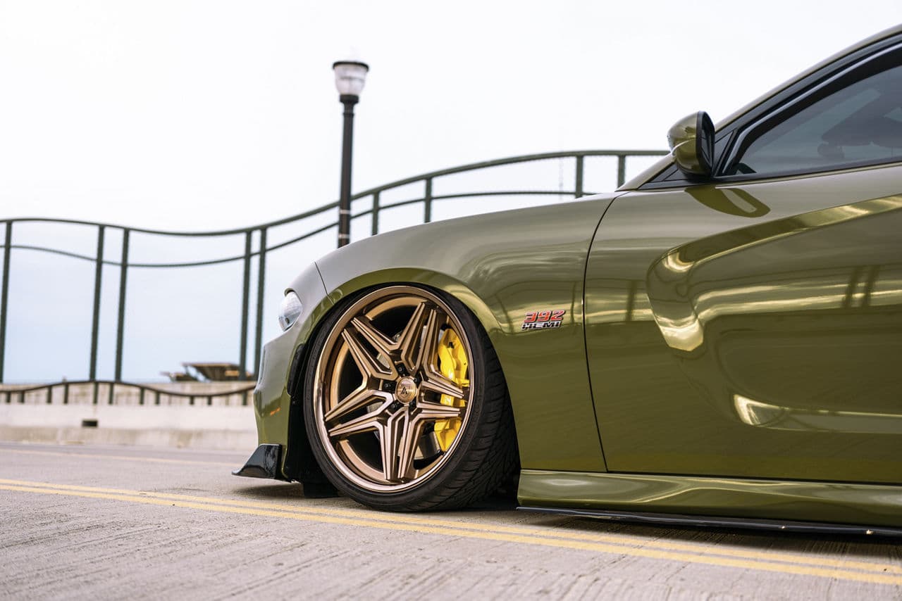 Side profile of 2022 Dodge Charger with wheels