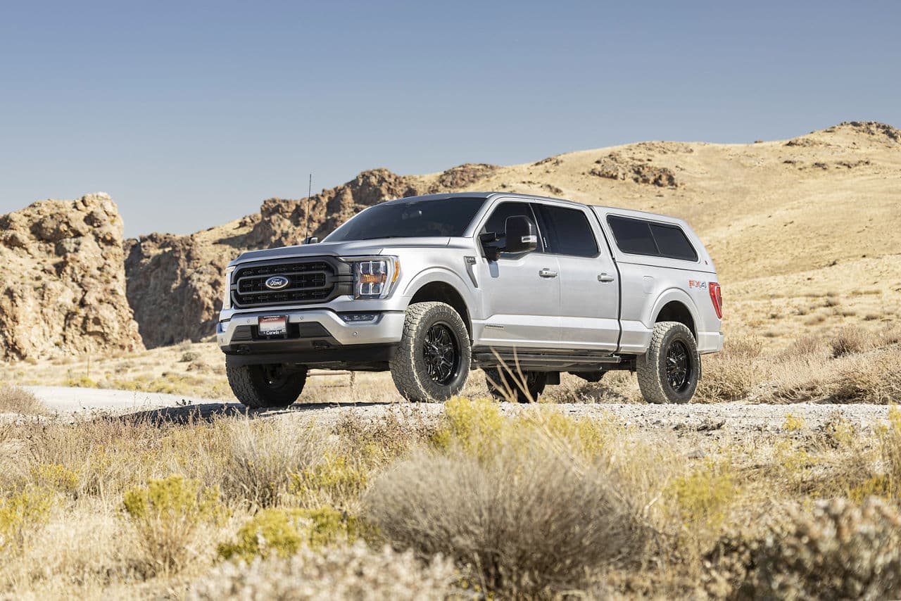 Side profile of 2022 Ford F150 FX4 with truck suv wheels