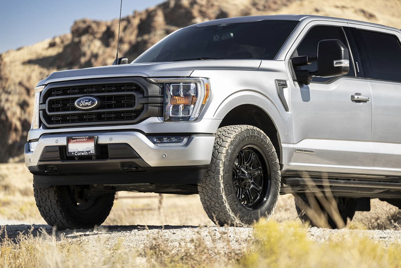 Detail view of 2022 Ford F150 FX4 with truck suv wheels