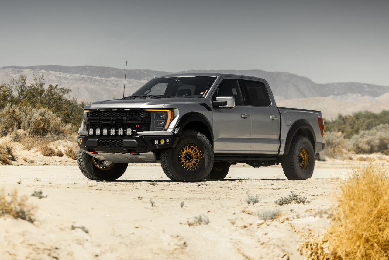 Front view of 2022 Ford F150 Raptor with truck suv wheels