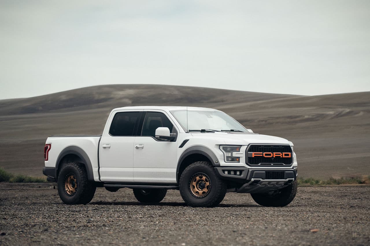 Front view of 2022 Ford F150 Raptor with truck suv wheels