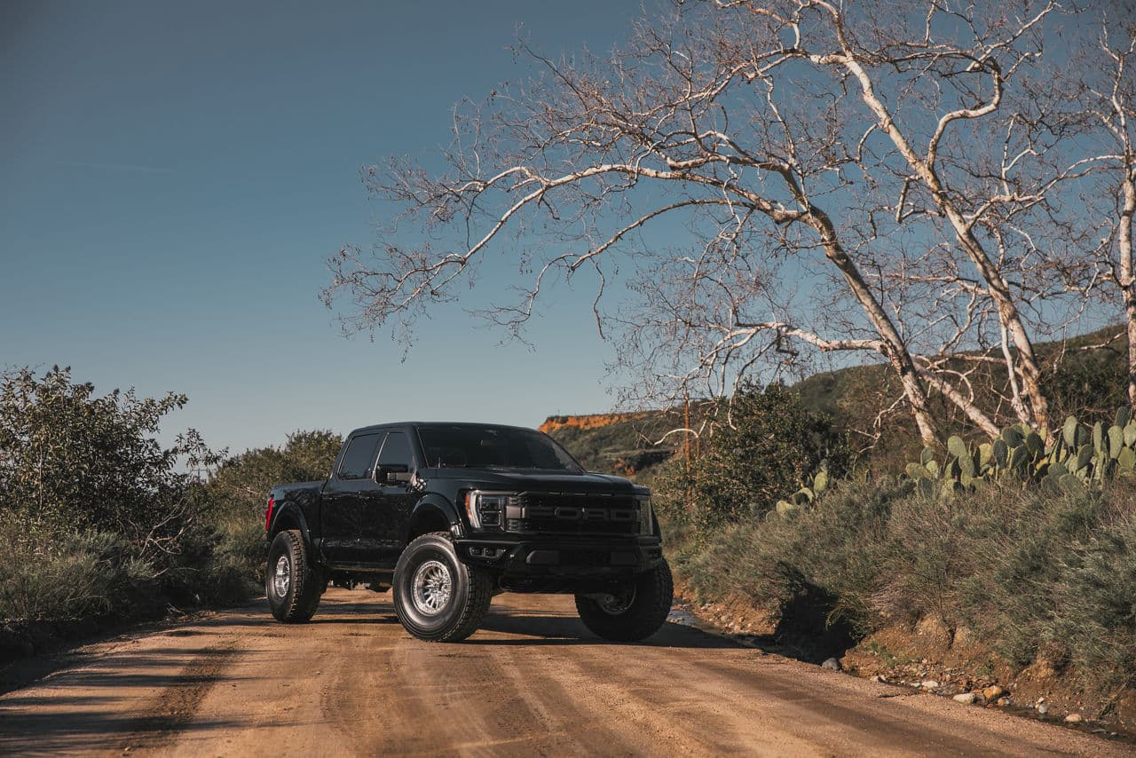 Front view of 2022 Ford F150 Raptor with truck suv wheels