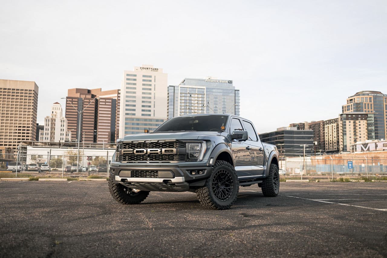 Front view of 2022 Ford F150 Raptor with truck suv wheels