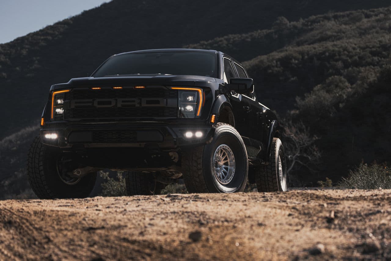 Side profile of 2022 Ford F150 Raptor with truck suv wheels