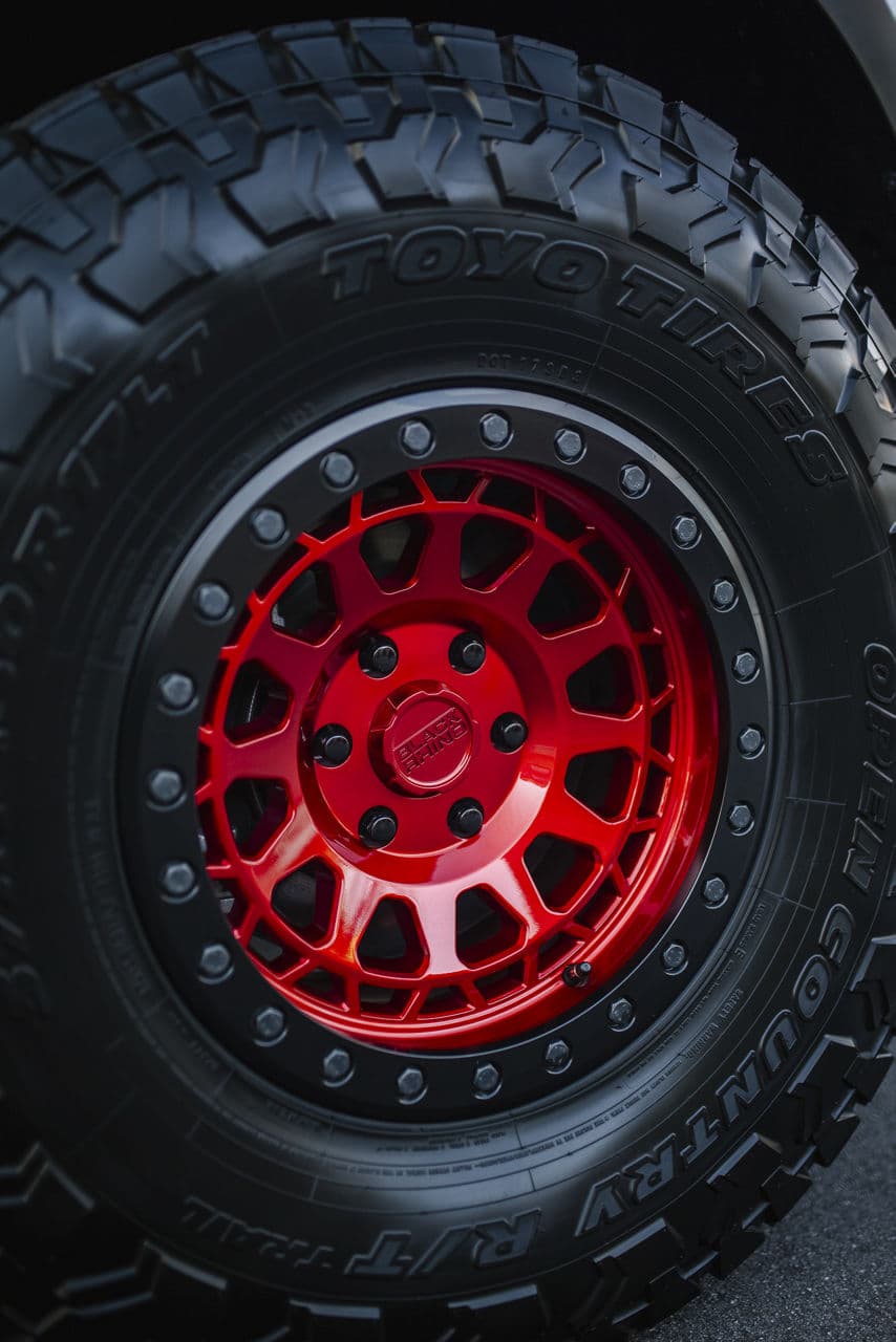 Side profile of 2022 Ford F150 Raptor with truck suv wheels