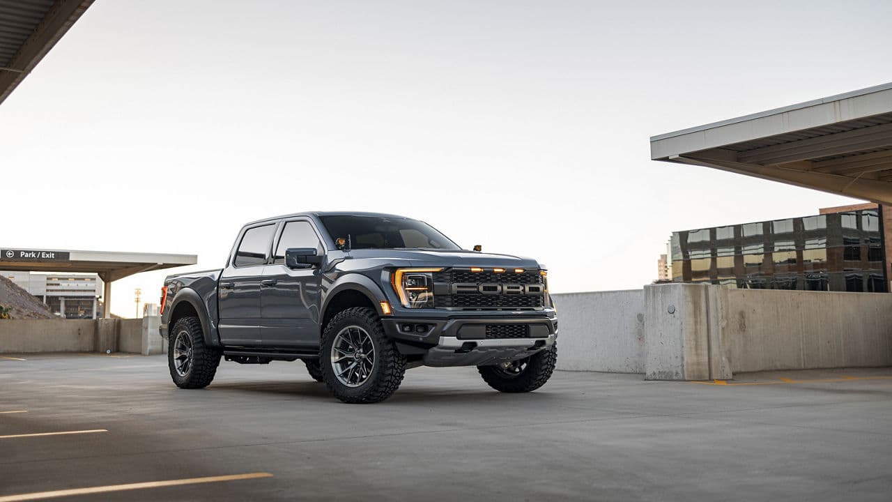 Side profile of 2022 Ford F150 Raptor with wheels