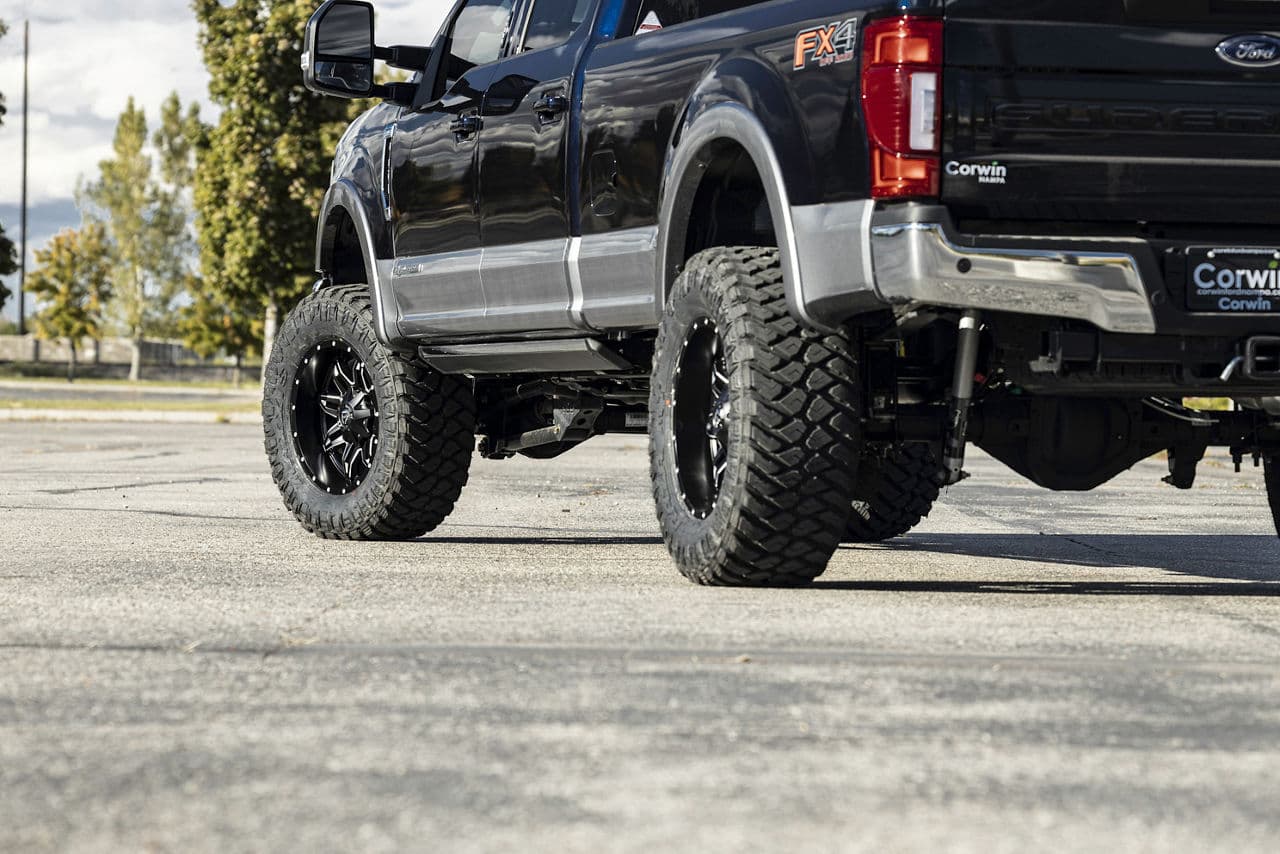 Rear view of 2022 Ford F350 Lariat with wheels