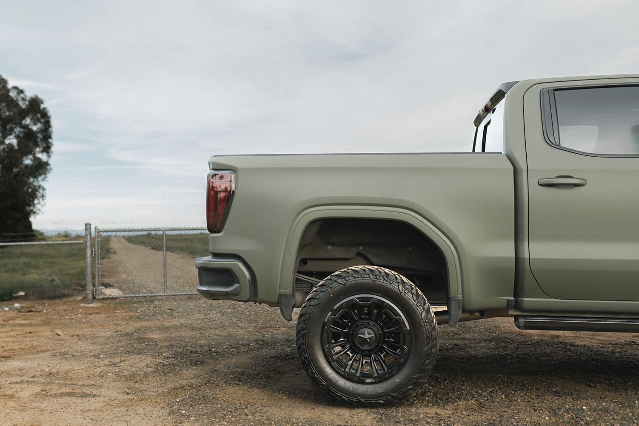 Rear view of 2022 GMC Sierra with truck suv wheels