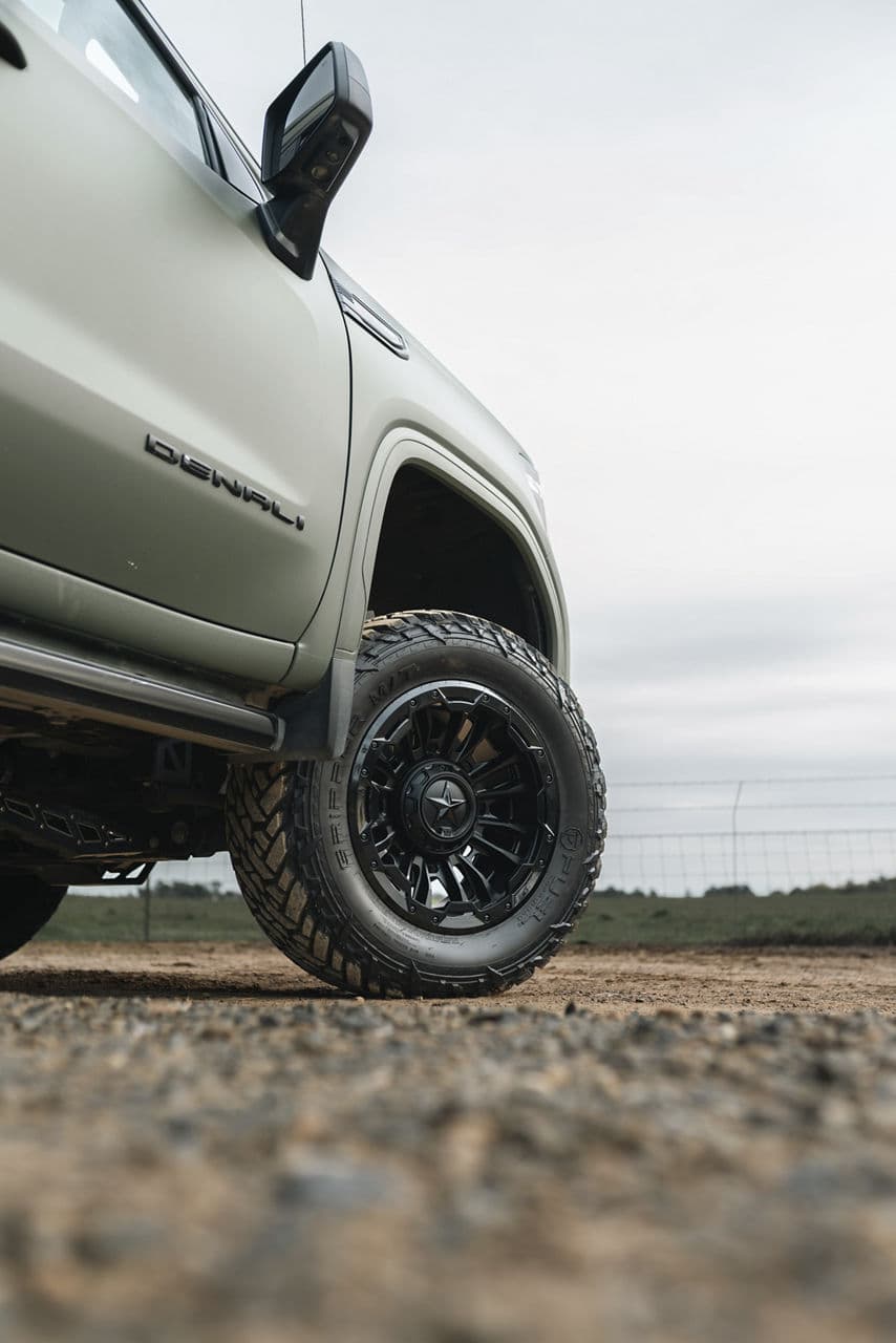 Detail view of 2022 GMC Sierra with truck suv wheels