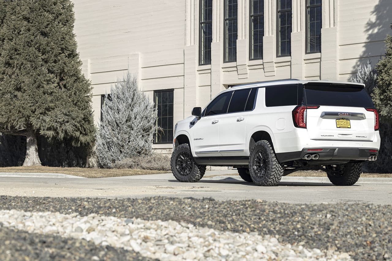 Rear view of 2022 GMC Yukon Denali with wheels