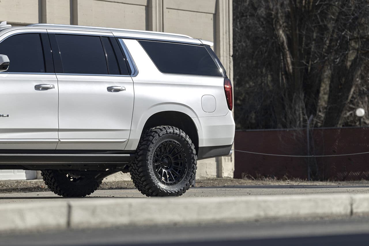 Detail view of 2022 GMC Yukon Denali with wheels