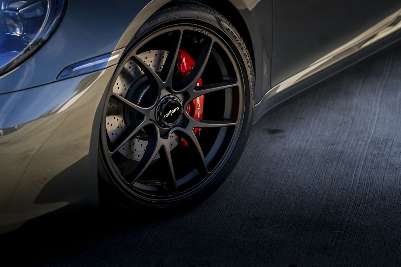 Side profile of 2022 Porsche 992 with wheels