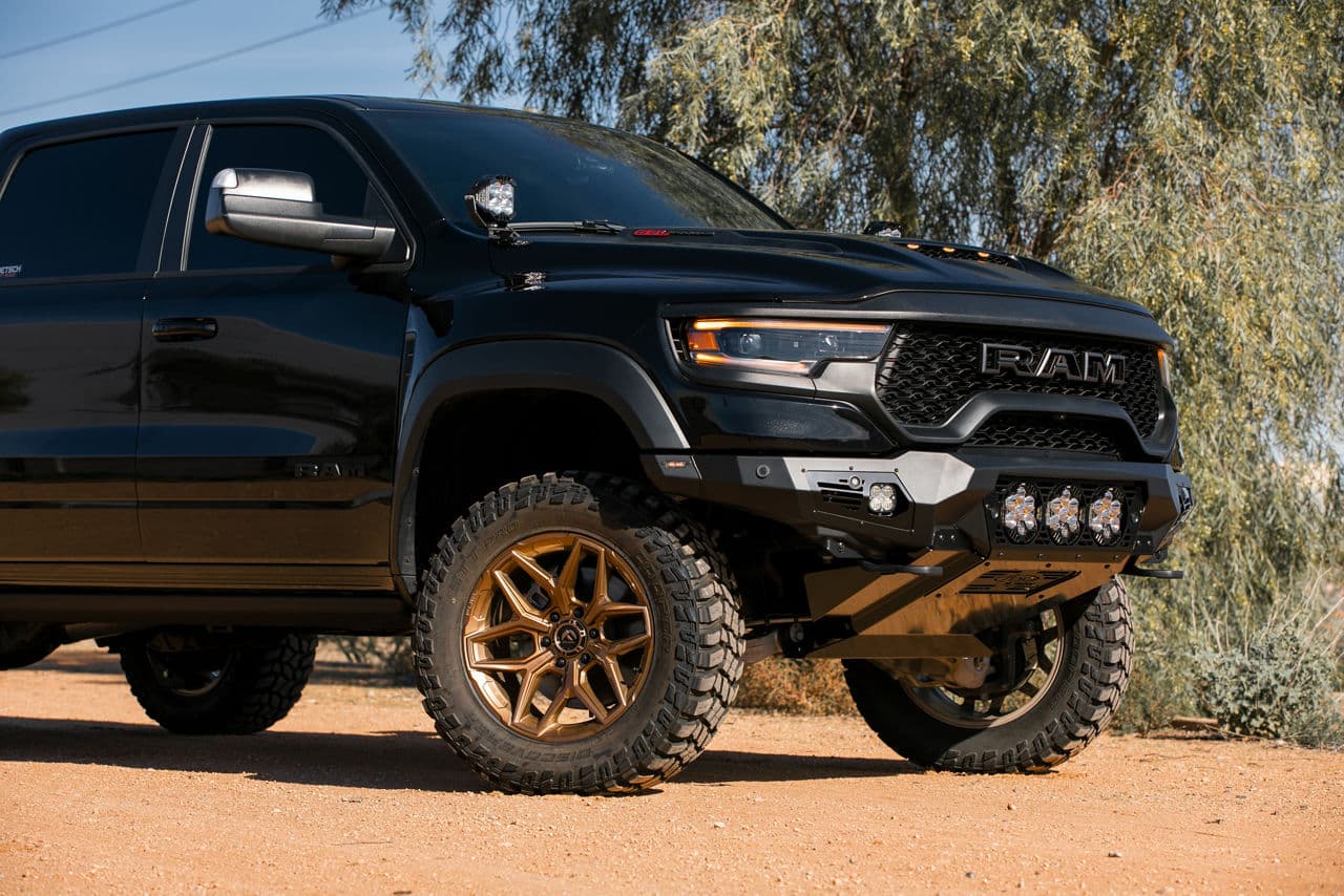 Side profile of 2022 Ram 1500 TRX with truck suv wheels