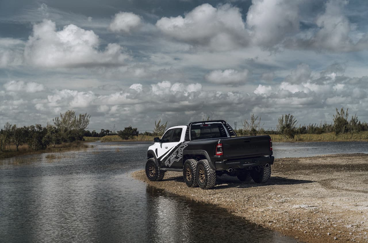 Rear view of 2022 Ram TRX 6X6 with truck suv wheels