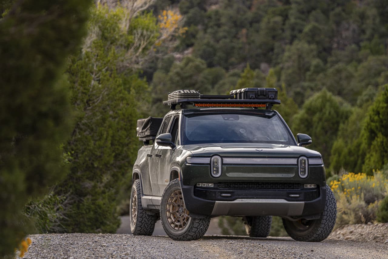 Side profile of 2022 Rivian R1T with truck suv wheels