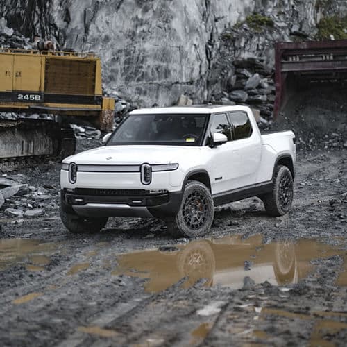 Detail view of 2022 Rivian R1T with truck suv wheels