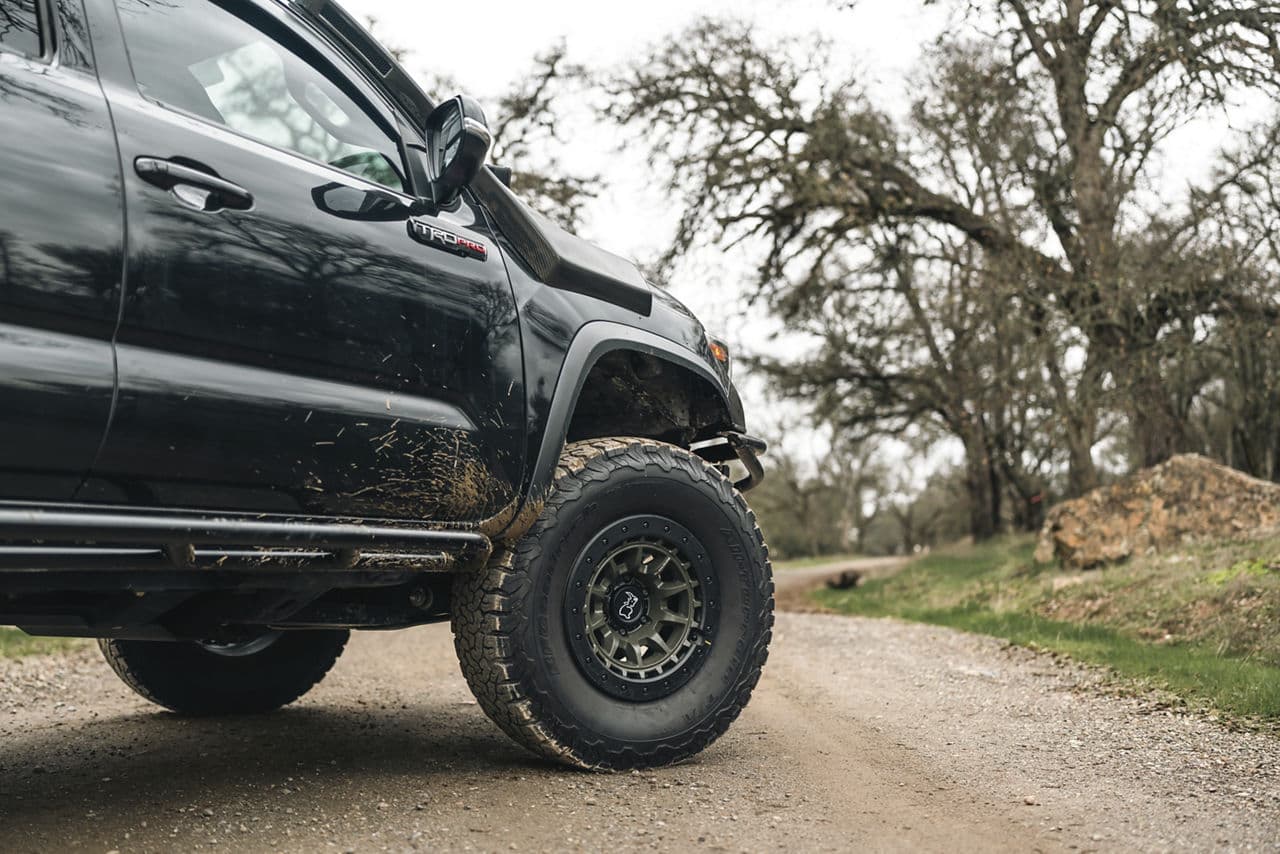Detail view of 2022 Toyota Tacoma with vehicle wraps