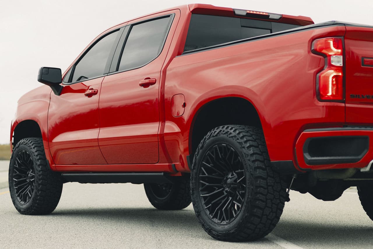 Side profile of 2023 Chevrolet Silverado with truck and suv wheels