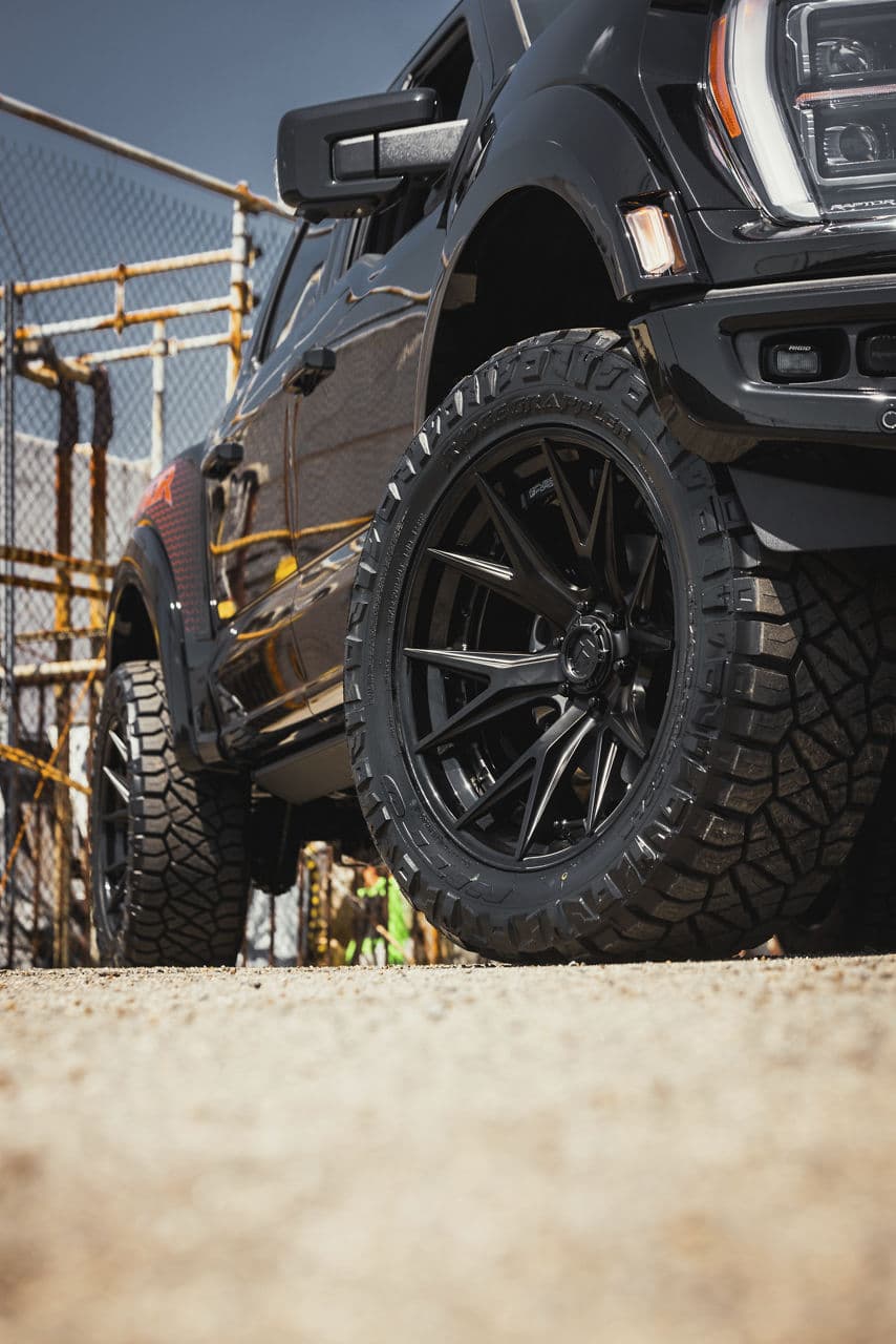 Detail view of 2023 Ford F150 Raptor with wheels