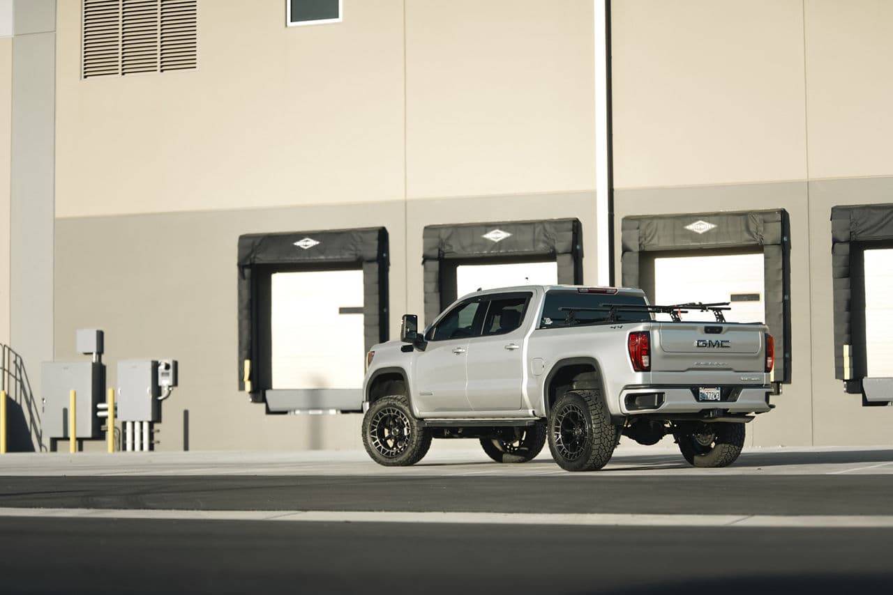 Side profile of 2023 GMC Sierra Denali with truck suv wheels