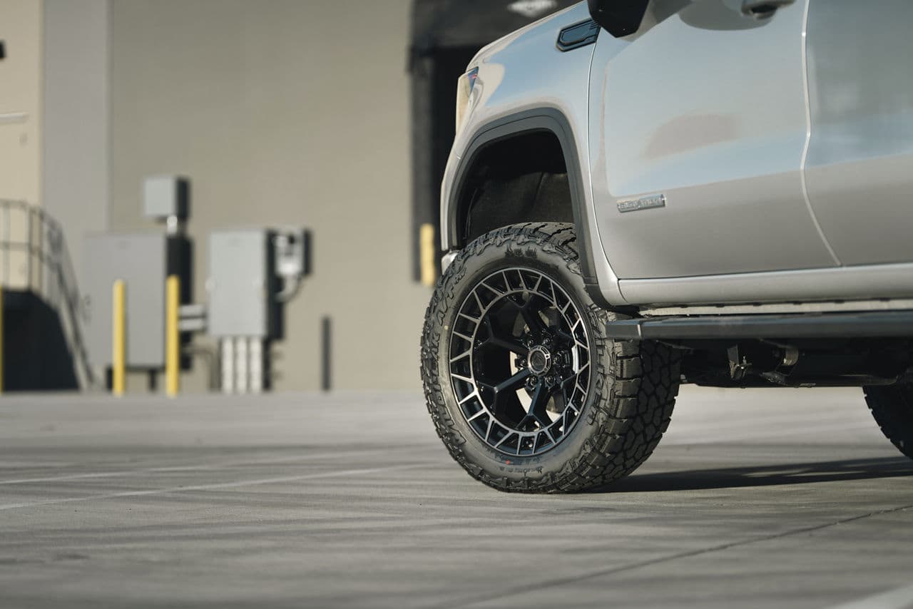 Rear view of 2023 GMC Sierra Denali with truck suv wheels