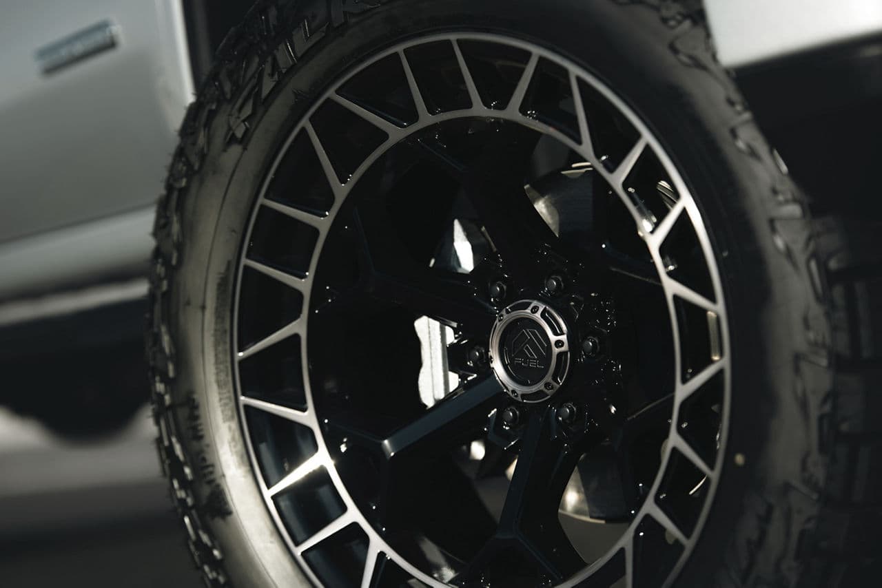 Detail view of 2023 GMC Sierra Denali with truck suv wheels
