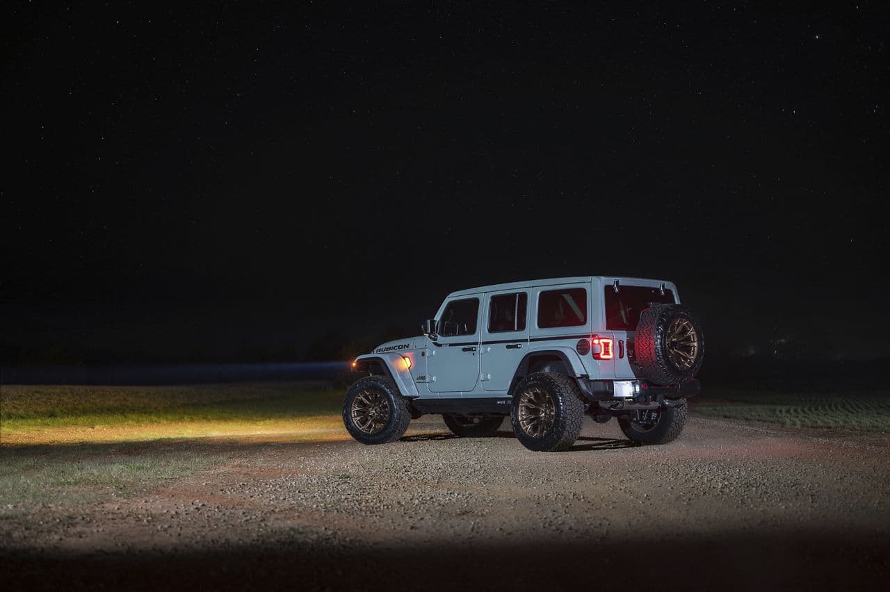 Side profile of 2023 Jeep Wrangler Rubicon with wheels