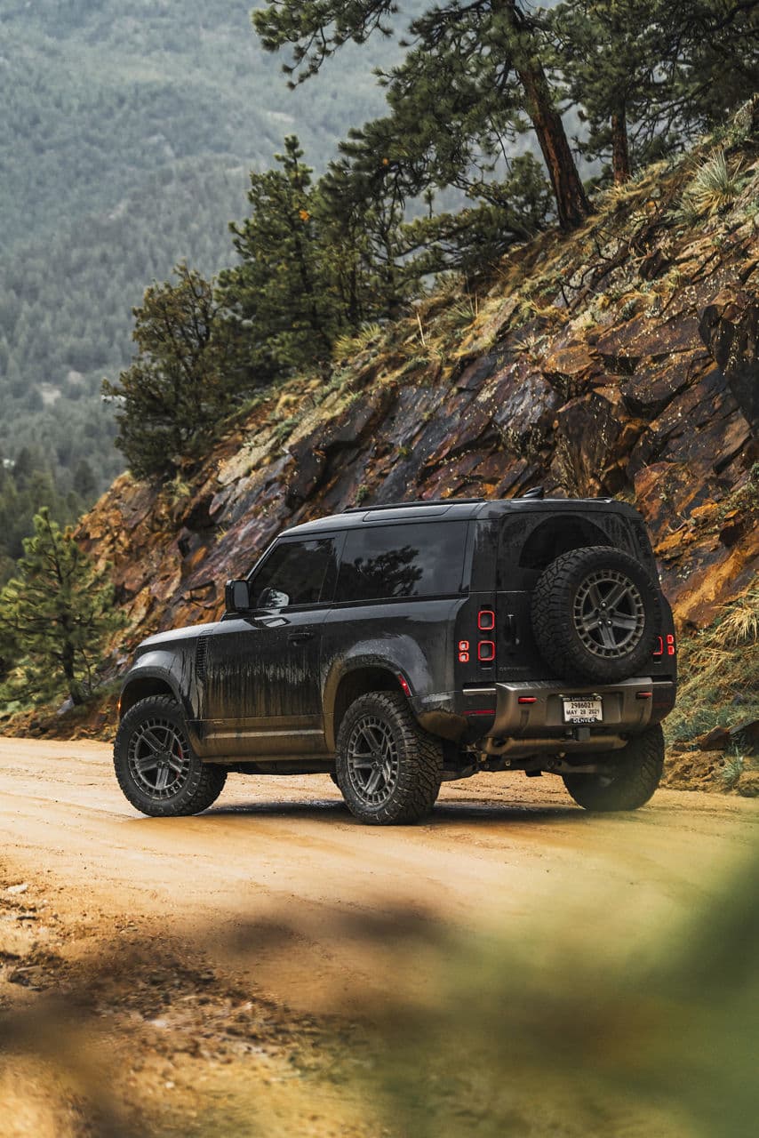 Rear view of 2023 Land Rover Defender 90 with truck suv wheels