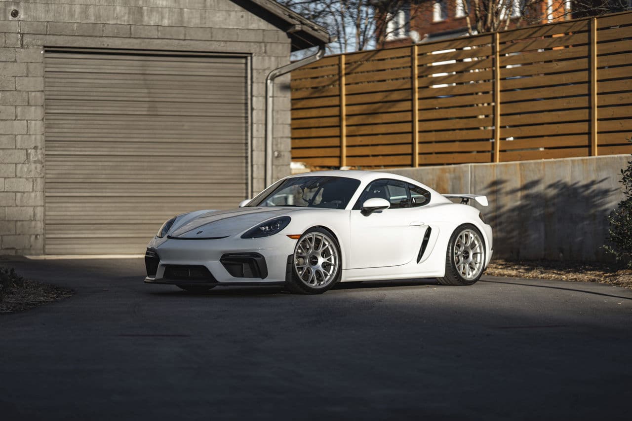 Front view of 2023 Porsche 718 GT4 with wheels