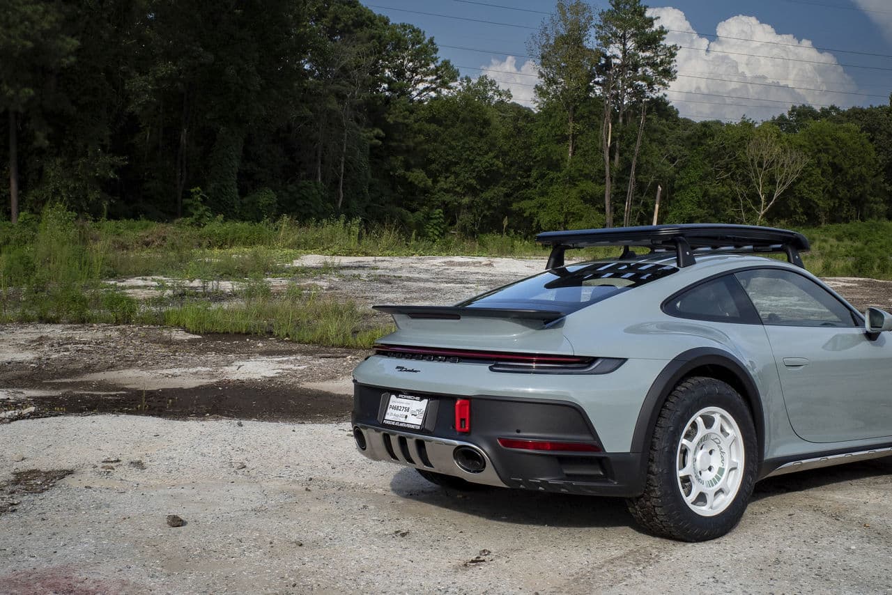 Rear view of 2023 Porsche 911 Dakar with wheels
