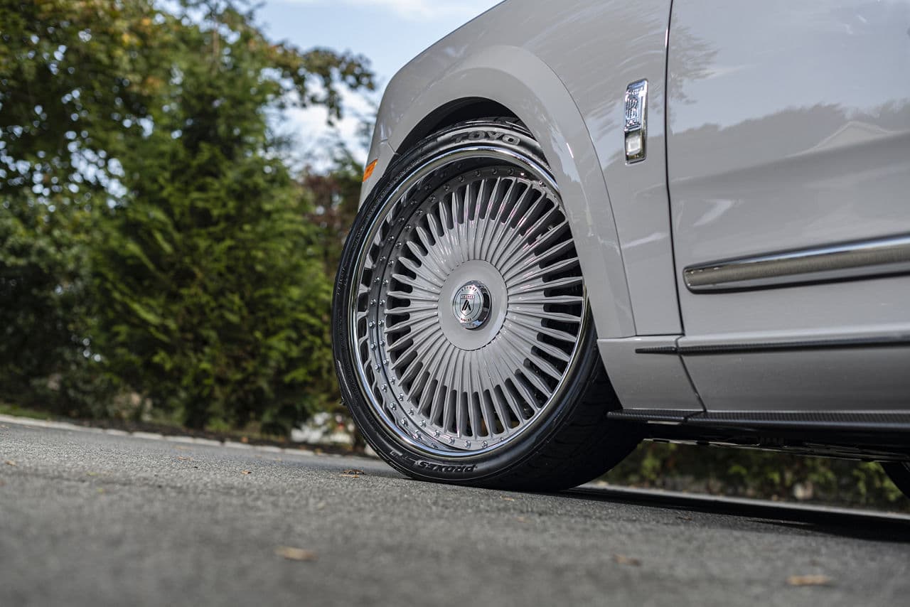 Rear view of 2023 Rolls-Royce Cullinan with wheels