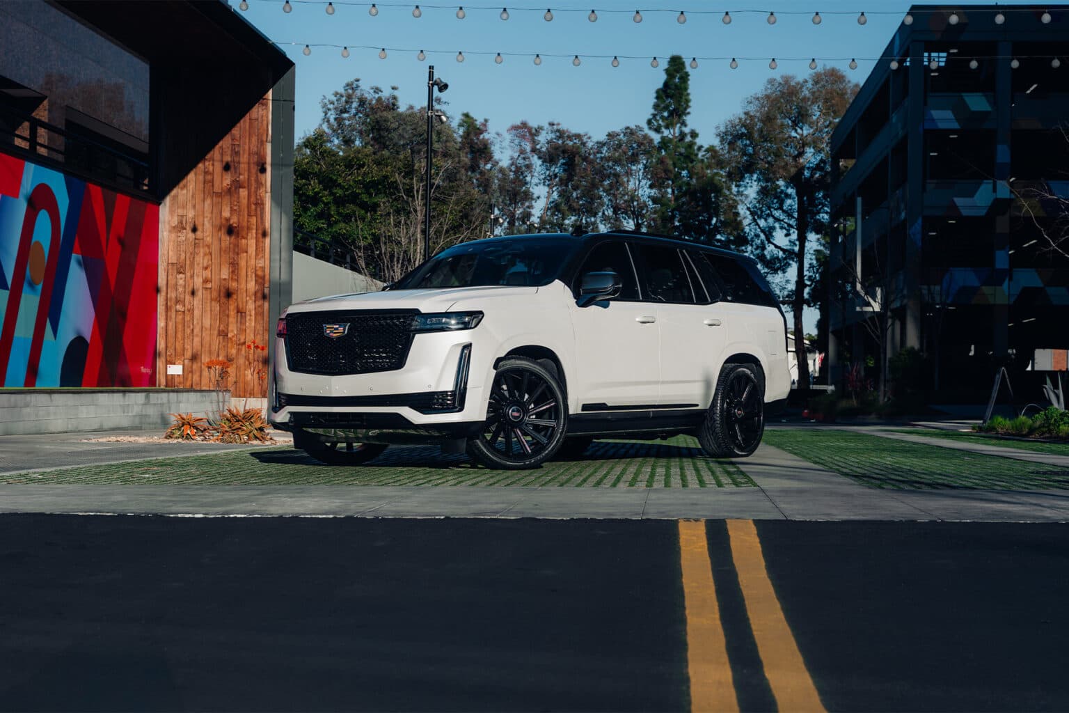 2024 Cadillac Escalade — coilovers, front view