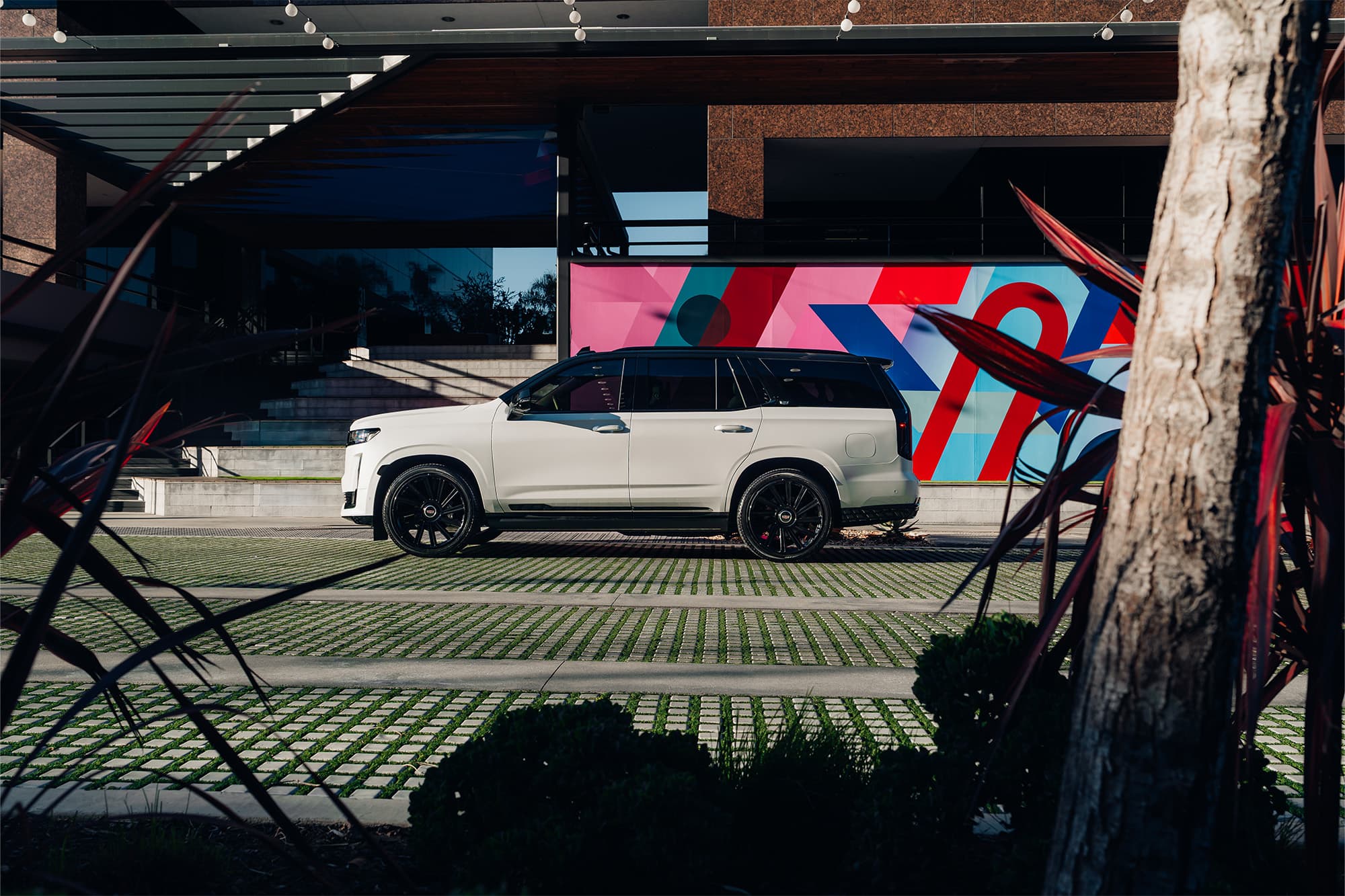 2024 Cadillac Escalade — coilovers, detail view