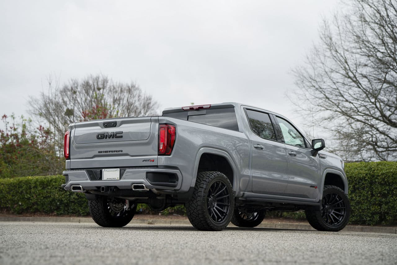 Side profile of 2024 GMC Sierra 1500 AT4 with truck suv wheels