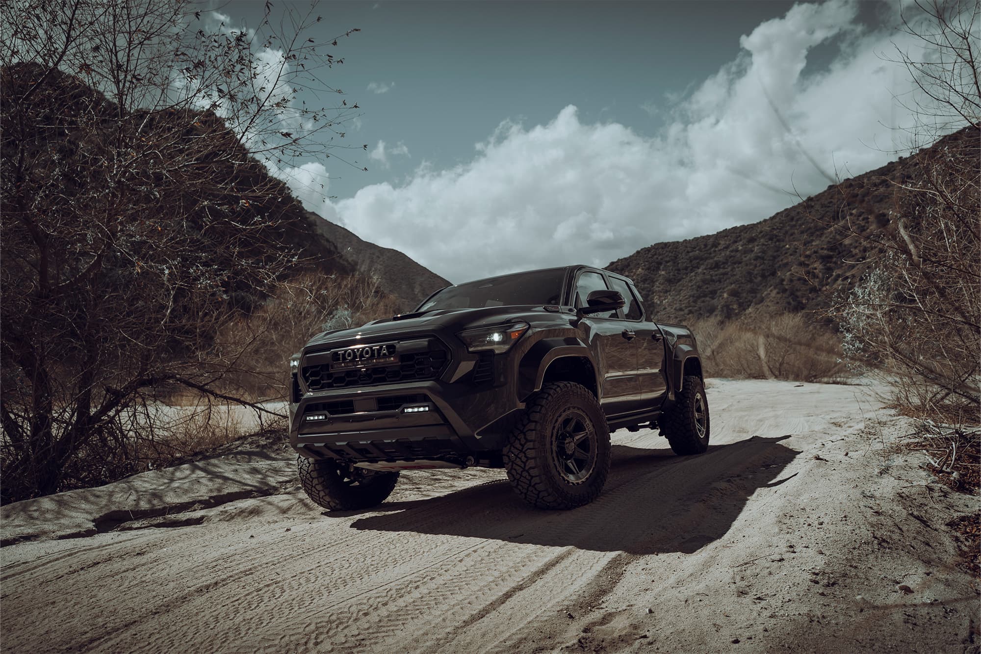2024 Toyota Tacoma — lowering springs, front view