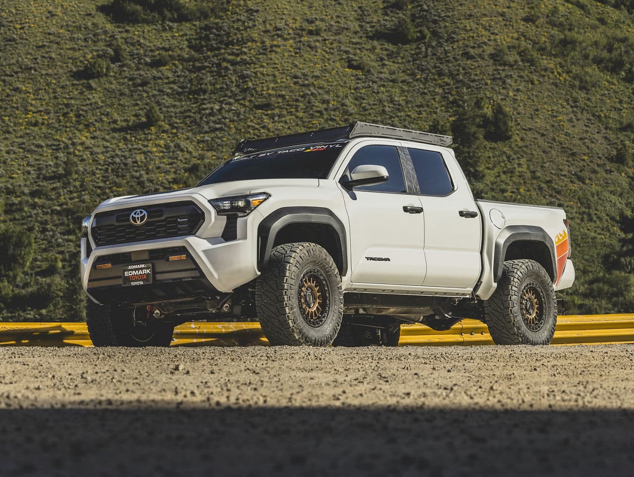 Front view of 2024 Toyota Tacoma with wheels