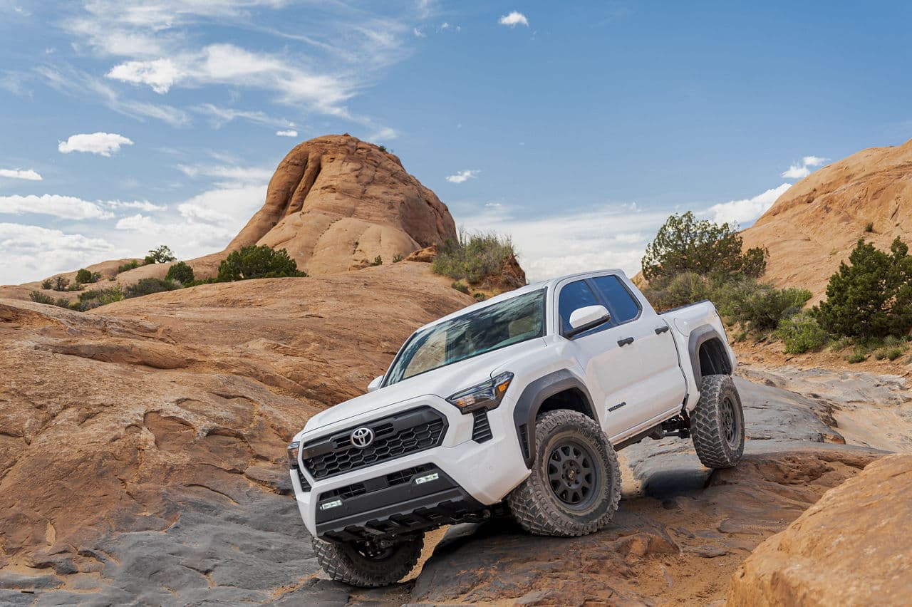 Side profile of 2024 Toyota Tacoma with wheels