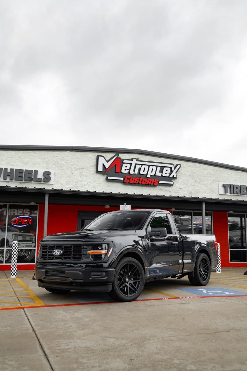 Lowered truck at Metroplex Customs in Irving, TX