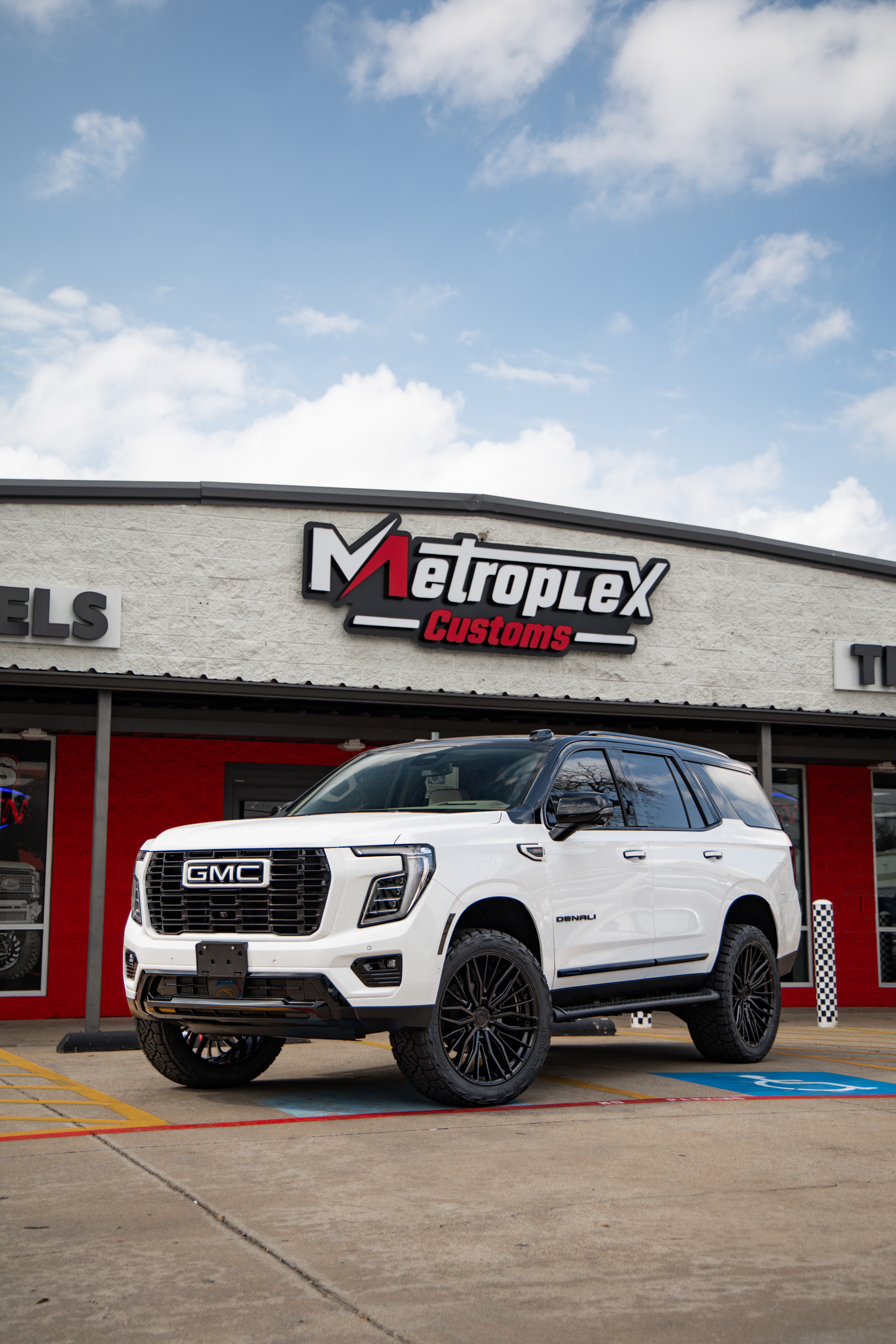Truck suspension installation at Metroplex Customs in Irving, TX